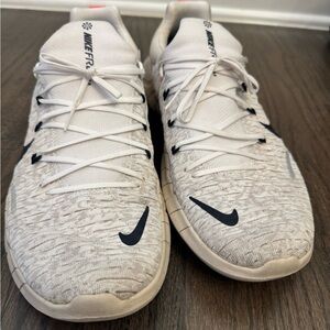 Nike Free Run 5.0 men's road running shoes in the white and obsidian colorway